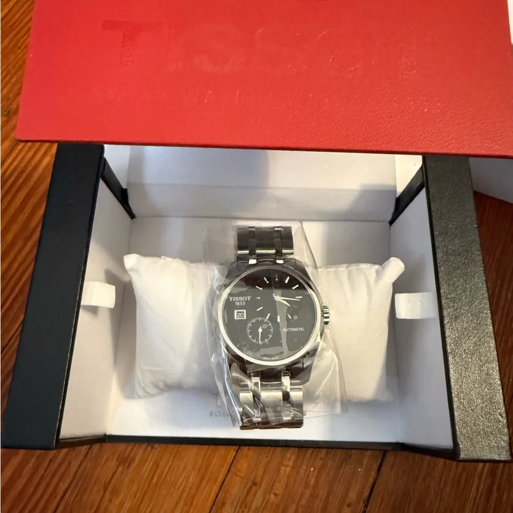 New in box authentic Tissot Classic Black and Silver Automatic Men’s 38MM Watch